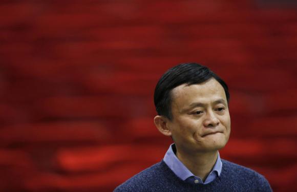 Alibaba Group Holding Ltd chairman Jack Ma reacts as he speaks to journalists after holding a talk by Our Hong Kong Foundation in Hong Kong