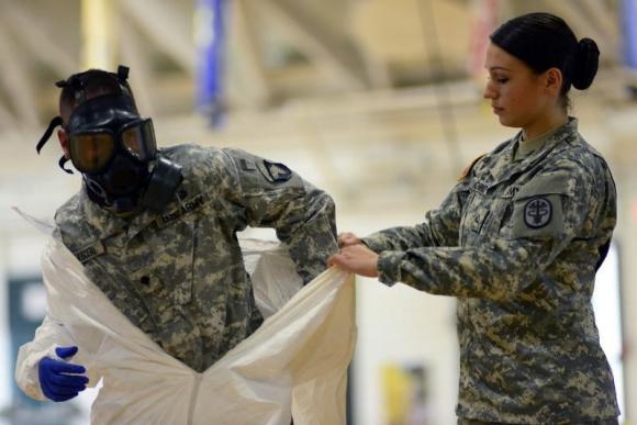 US Army soldiers from the 101st Airborne Division, who are earmarked for the fight against Ebola, train before their deployment to West Africa, at Fort Campbell