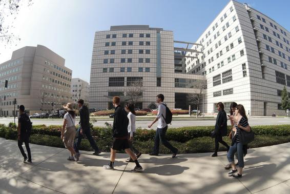 People walk past the entrance to the Ronald Reagan UCLA Medical Center in Los Angeles, California