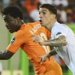 Wilfried Bony and Carl Medjani of Algeria