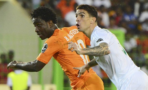 Wilfried Bony and Carl Medjani of Algeria