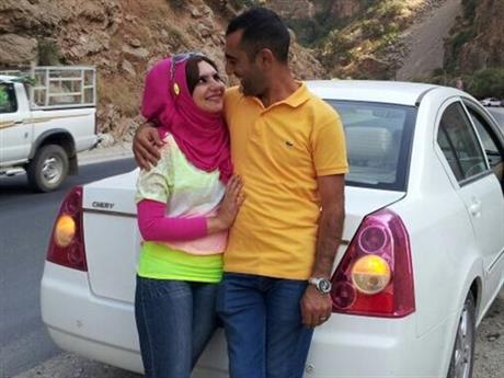 Atlaie, left, and her husband Ahmed Al-Jumaili