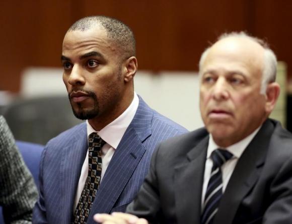 Former NFL star Darren Sharper and his attorney Leonard Levine appear at the Clara Shortridge Foltz Criminal Justice Center in Los Angeles