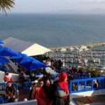Tourists are seen in a coffee shop in Sidi Bou Said, a tourist destination, on the outskirts of the capital Tunis