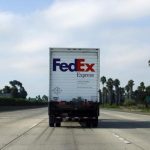 Federal Express truck makes its way down a freeway in San Diego, California