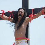 A Filipino penitent grimaces
