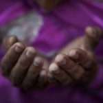 A Muslim woman prays