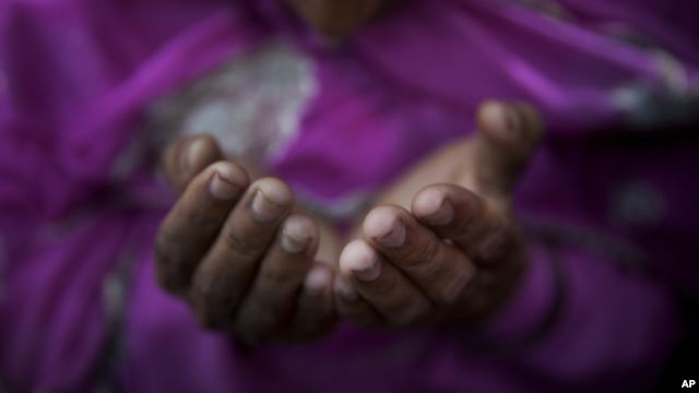 A Muslim woman prays