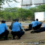 Police officers outside Garissa University College