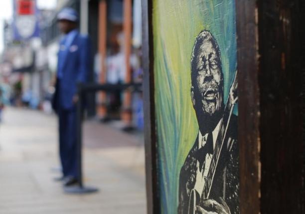 A painting of Blues legend B.B. King adorns a building wall on Beale Street in Memphis