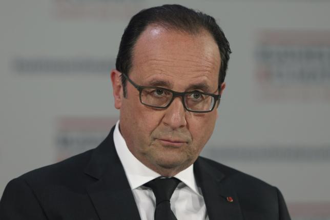 French President Hollande attends the "Business and Climate Summit 2015" at  UNESCO headquarters in Paris