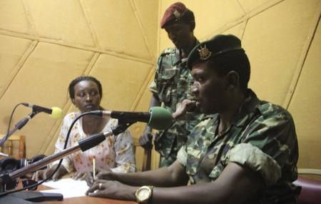 File photo of Major General Niyombare flanked by former Defense Minister Ndayirukiye addressing the nation inside the RPA broadcasting studios in Burundi's capital Bujumbura
