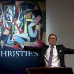 Auctioneer Jussi Pylkkanen calls for final bids before dropping the gavel as he sells Pablo Picasso's "Les femmes d'Alger (Version 'O')" (Women of Algiers) at Christie's Auction House in the Manhattan borough of New York