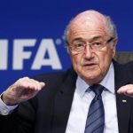 Re-elected FIFA President Blatter gestures during a news conference after an extraordinary Executive Committee meeting in Zurich