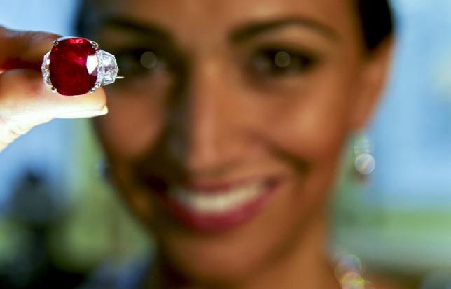 File photo of a model holding the "Sunrise Ruby" during an auction preview at Sotheby's auction house in Geneva, Switzerland