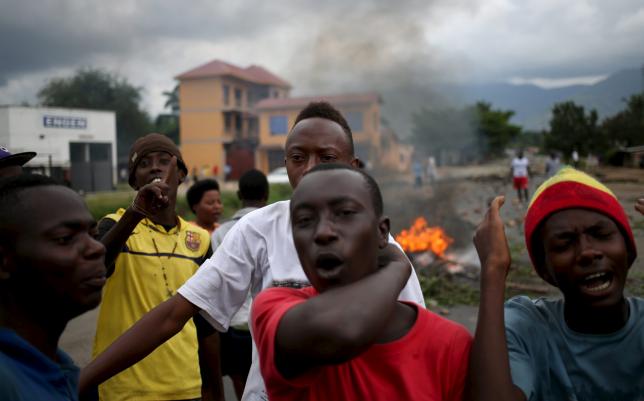 Protesters shout during a protest against Burundi's President Pierre Nkurunziza and his bid for a third term in Bujumbura