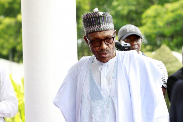 Nigeria's President Muhammadu Buhari arrives for Summit of Heads of State and Governments of the Lake Chad Basin Commission at presidential wing of the Nnamdi Azikiwe International Airport Abuja