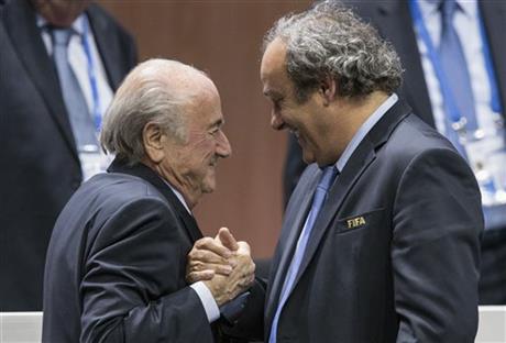Sepp Blatter and Michel Platini, right