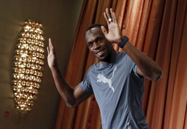 Jamaica's track star Usain Bolt attends a news conference in the Manhattan borough