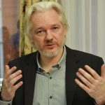 WikiLeaks founder Julian Assange gestures during a news conference at the Ecuadorian embassy in central London