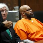 Defendant Marion "Suge" Knight looks on as he attends a hearing with his attorney Thomas Mesereau in his robbery case in Los Angeles, California
