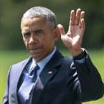 U.S. President Barack Obama waves as he walks from the Oval Office of the White House in Washington
