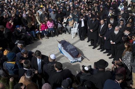 Family and friends of Israeli Dafna Meir attend her funeral in a cemetery in Jerusalem