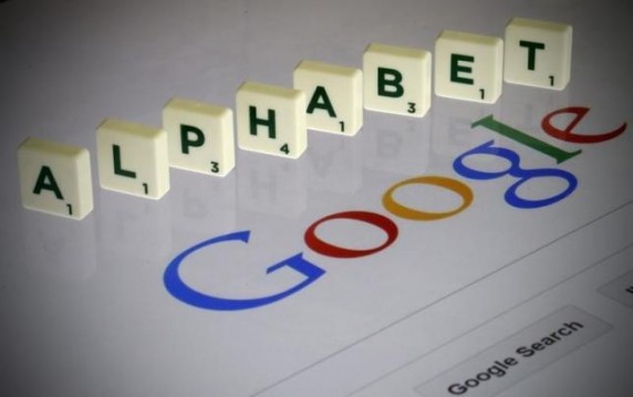 Letters spell the word "Alphabet" as they are seen on a computer screen with a Google search page in this photo illustration taken in Paris