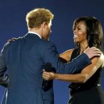Prince Harry, left, Michelle Obama