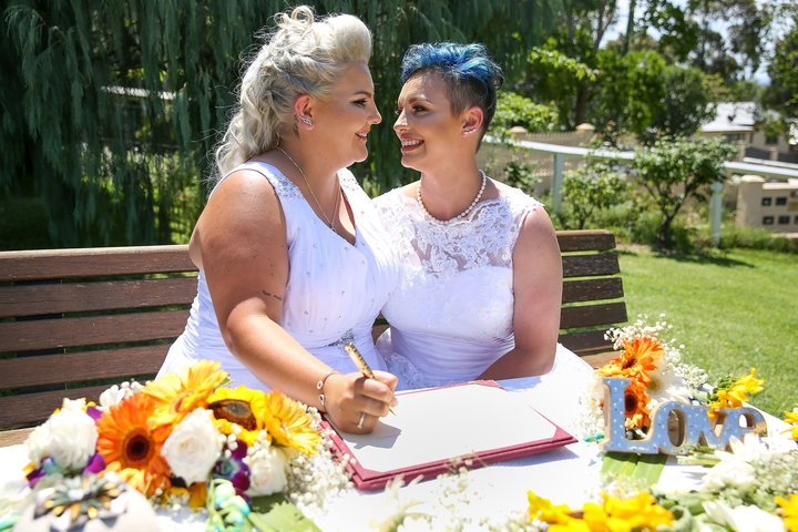 Newly married same-sex couple Amy Laker and Lauren Price