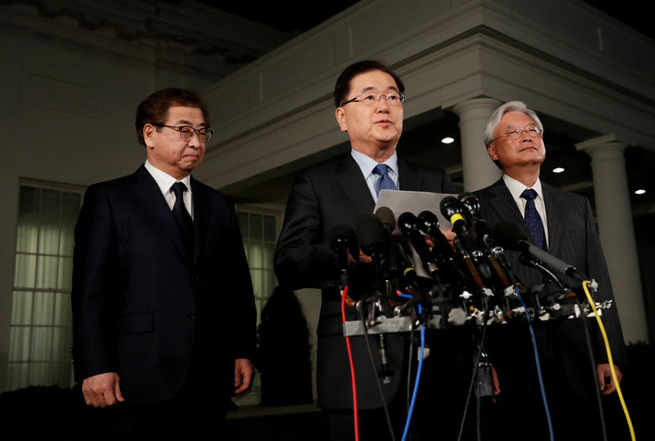 South Korea's National Security Office head Chung Eui-yong, Cho Yoon-je, the South Korean Ambassador to the U.S. and National Intelligence Service chief Suh Hoon, (L)