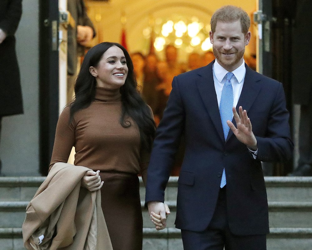 Britain's Prince Harry and Meghan