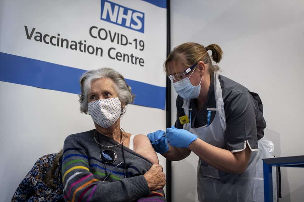 Dr Doreen Brown, 85, receives the first of two Pfizer/BioNTech COVID-19 vaccine