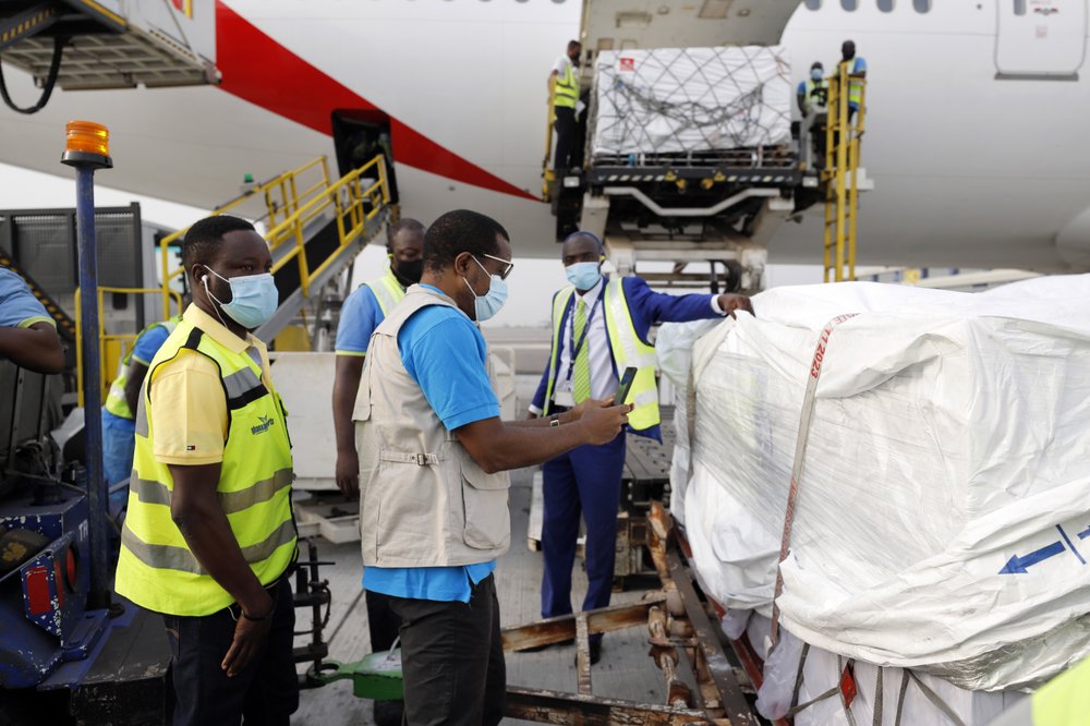 shows the first shipment of COVID-19 vaccines distributed by the COVAX Facility arriving at the Kotoka International Airport in Accra