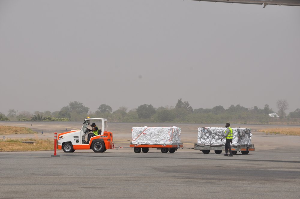 COVID-19 vaccines are offloaded from a plane at Lagos airport