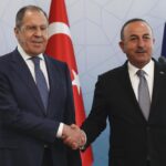 Russian Foreign Minister Sergey Lavrov, left, and Turkish Foreign Minister Mevlut Cavusoglu