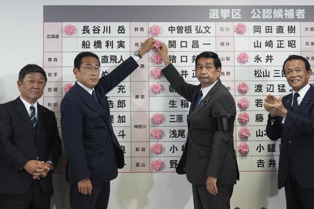 Fumio Kishida, second left, Japan's prime minister and president of the Liberal Democratic Party (LDP)