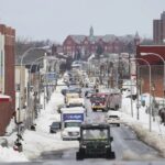 Vehicles drive down Jefferson Avenue in Buffalo. N.Y.