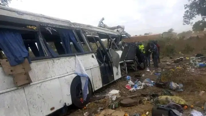 A damaged bus is pictured at the site of a collision between two buses on a road in Gniby, Senegal, Sunday Jan. 8, 2023. At least 40 people were killed and dozens injured in this bus crash in central Senegal, the country's president Macky Sall said Sunday. (Elimane Fall via AP)
