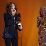 Bonnie Raitt accepts the award for song of the year for "Just Like That" at the 65th annual Grammy Awards on Sunday