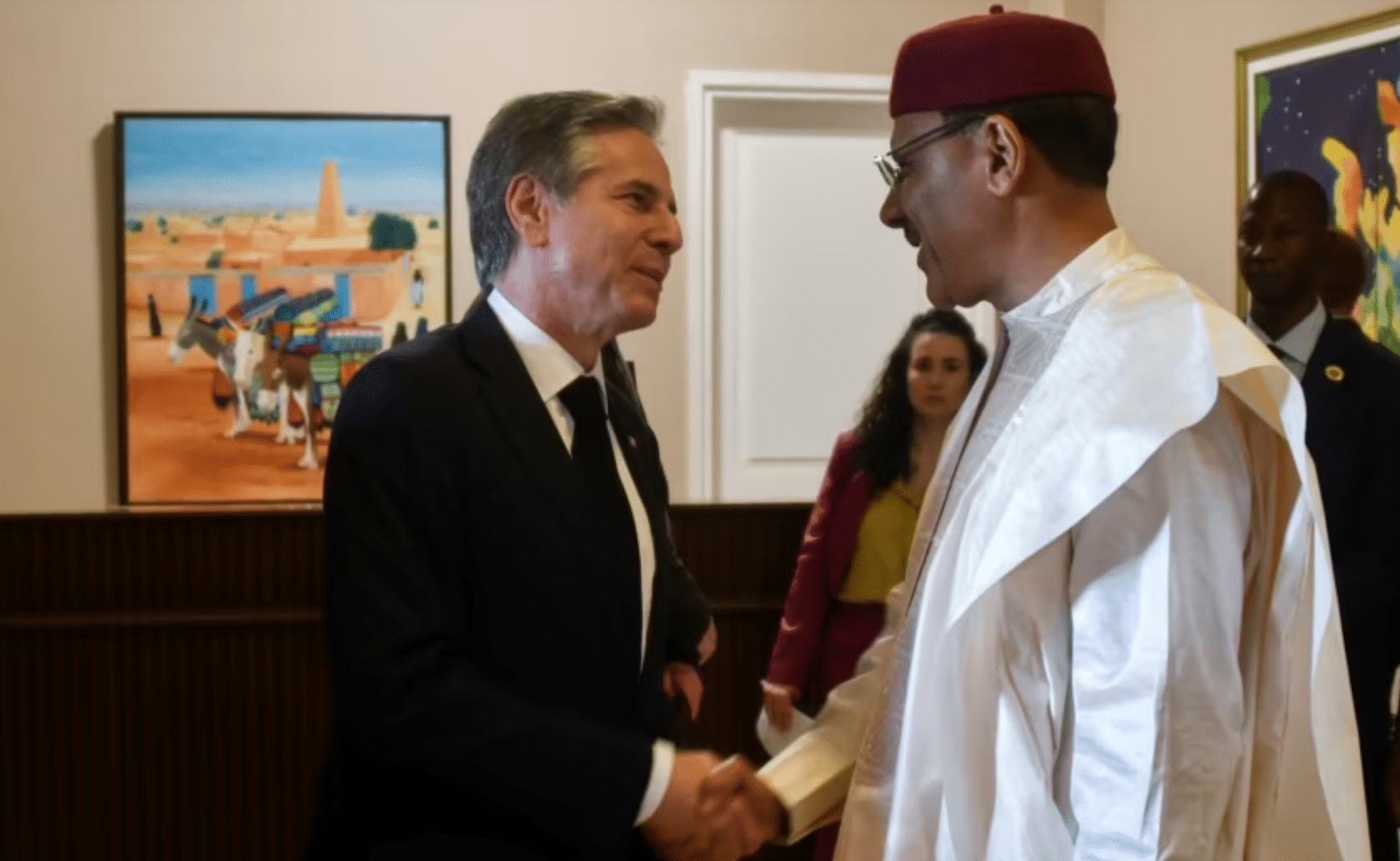 U.S. Secretary of State Antony Blinken, left, shakes hands with Nigerien President Mohamed Bazoum  