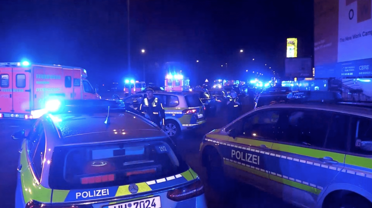 Police secure the area following a deadly shooting in Hamburg