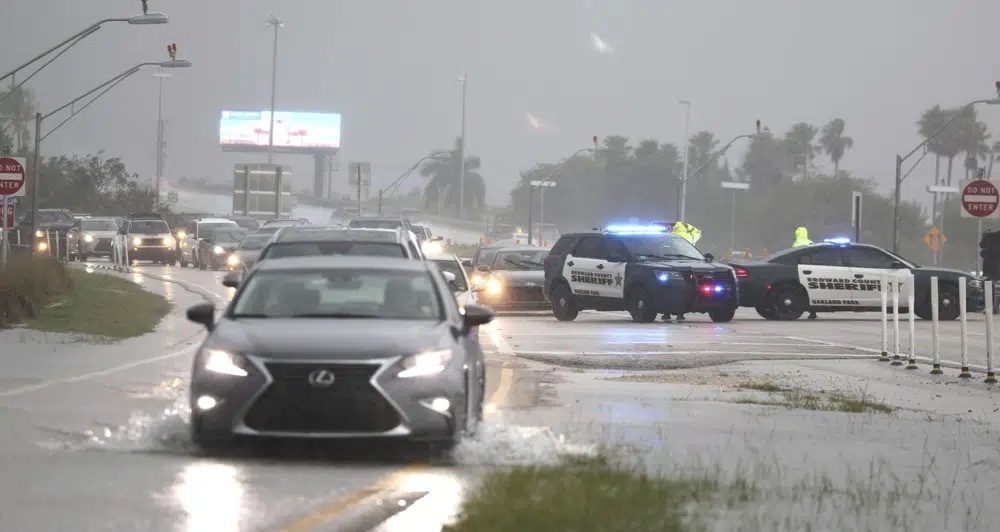 Broward Sheriff's Office deputies direct traffic away from the Fort Lauderdale-Hollywood International Airport