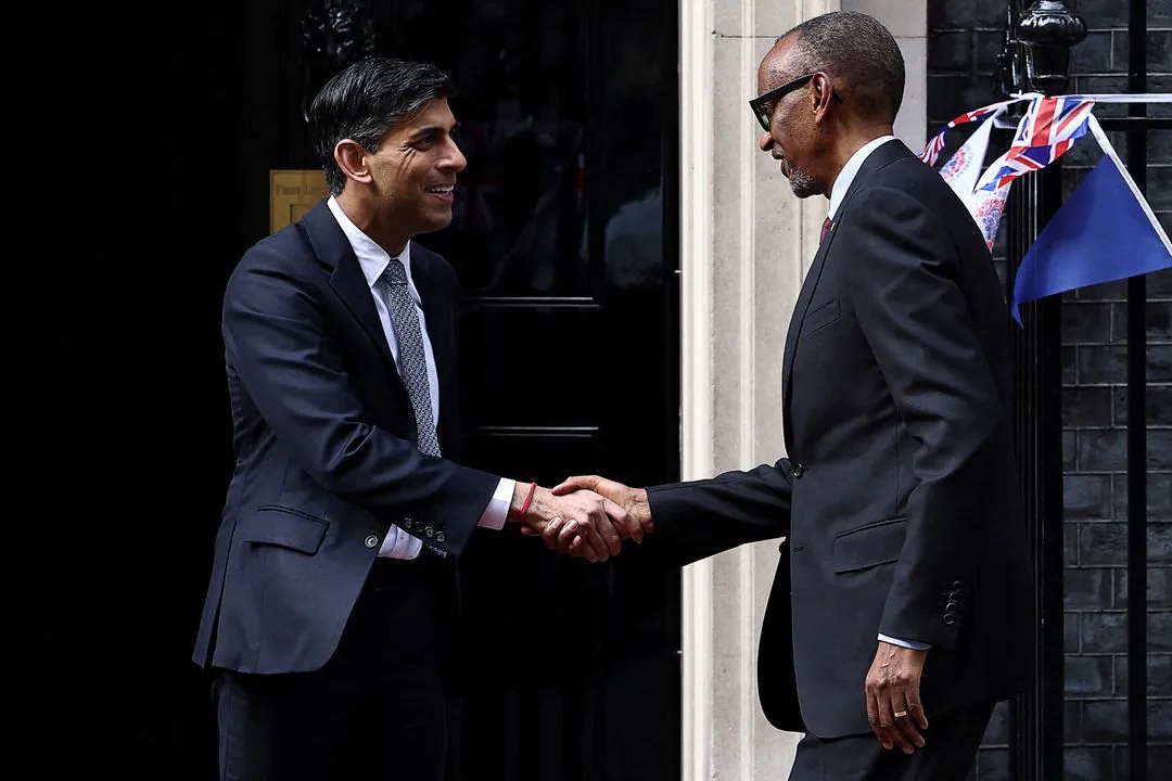 British Prime Minister Rishi Sunak shakes hands with Rwandan President Paul Kagame at Downing Street in London