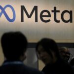 Attendees visit the Meta booth at the Game Developers Conference 2023 in San Francisco on March 22, 2023