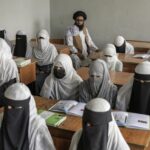 Afghan girls attend a religious school, which remained open since the last year’s Taliban takeover, in Kabul, Afghanistan