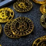 Bitcoin coins are seen at a stand during the Bitcoin Conference 2023, in Miami Beach, Florida, U.S., May 19, 2023. REUTERS/Marco Bello/File photo