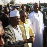 Prime Minister of Niger, Ali Mahamane Lamine Zeine, Prime Minister of Burkina Faso Apollinaire Joachim Kyelem de Tambela and Prime Minister of Mali Choguel Kokalla Maiga walk as they attend a sit-in in Niamey, Niger, December 29, 2023. REUTERS/Mahamadou Hamidou/File Photo