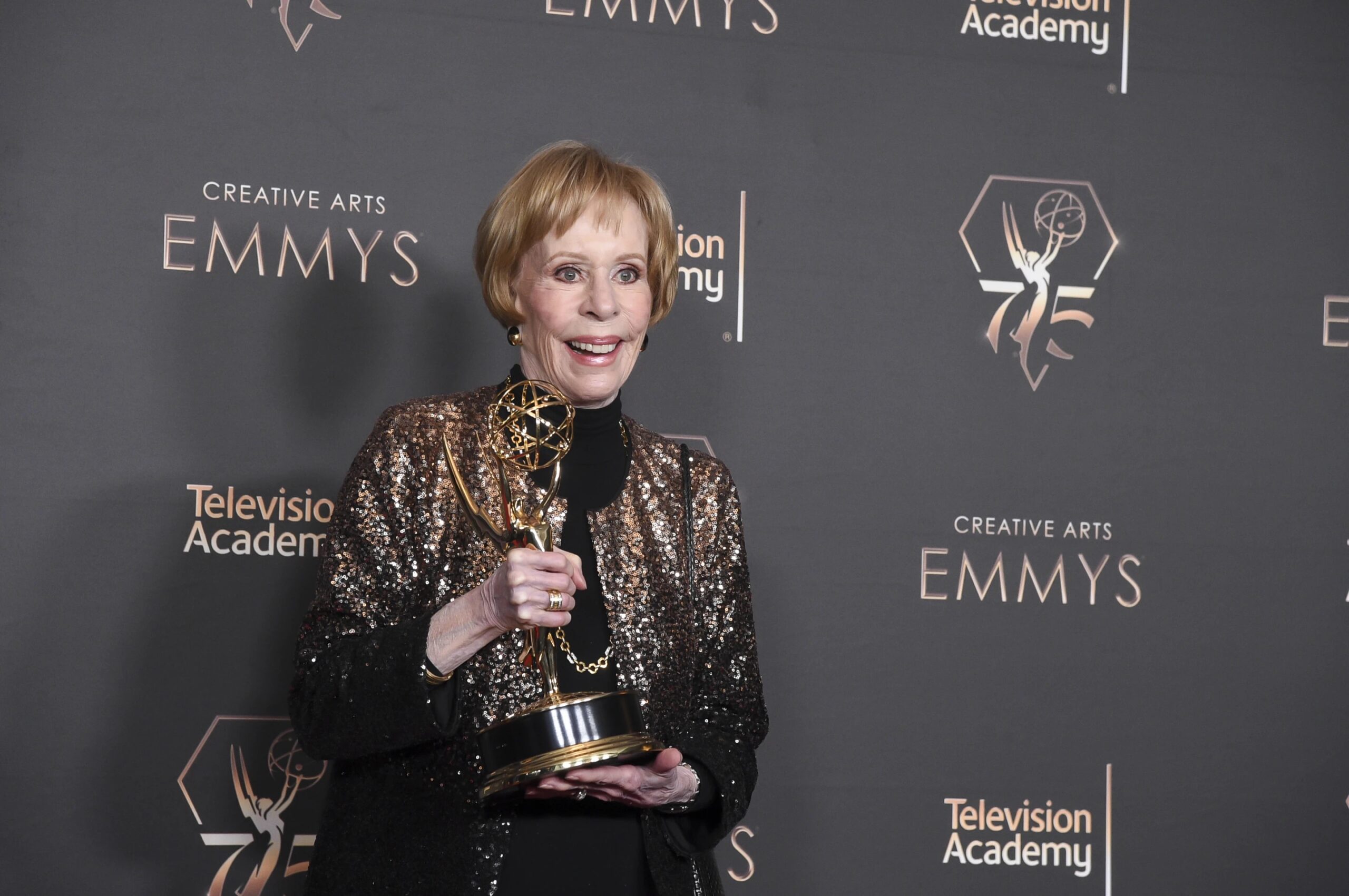 Carol Burnett pose in the press room with the award for outstanding variety special (Pre-Recorded) for “Carol Burnett: 90 Years Of Laughter and Love” during night two of the Creative Arts Emmy Awards on Sunday Jan. 7, 2024, at the Peacock Theater in Los Angeles. (Photo by Richard Shotwell/Invision/AP)