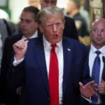 Former U.S. President Donald Trump gestures
